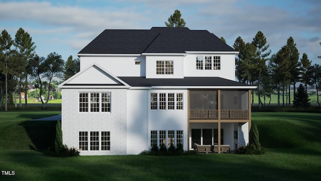 rear view of house featuring a yard and a sunroom