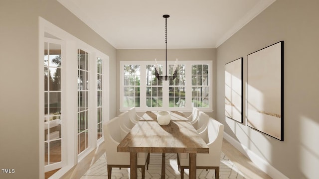 sunroom featuring a chandelier