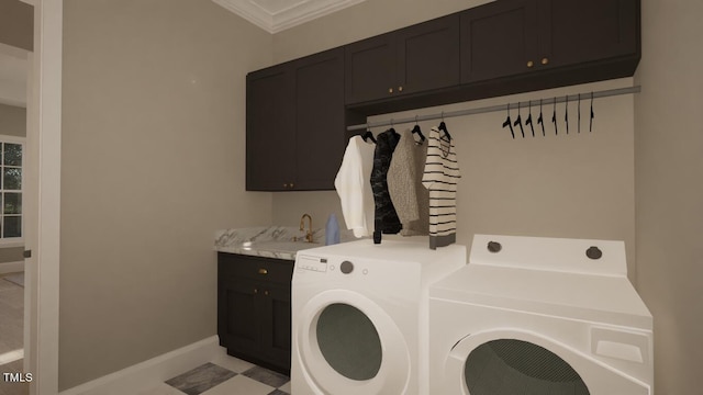 laundry room with sink, crown molding, cabinets, and washing machine and clothes dryer