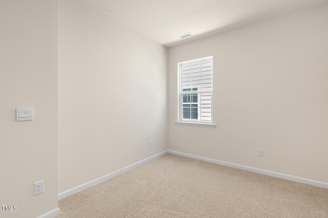 unfurnished room with carpet