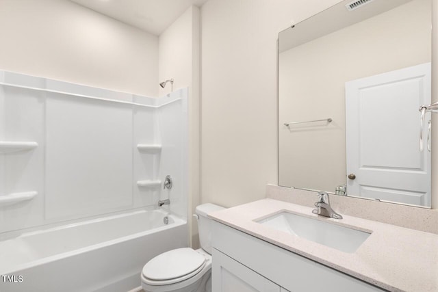 full bathroom featuring toilet, vanity, and shower / bathtub combination