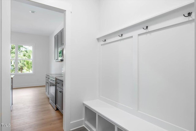 mudroom with light wood-type flooring