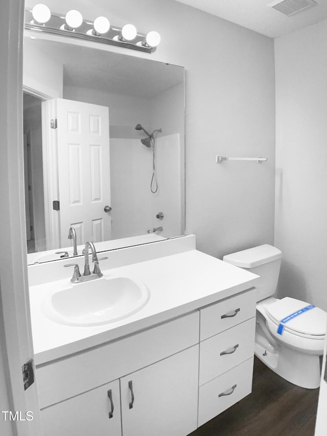 1432 Quarter Pt, Raleigh, NC 27615 - bathroom with vanity and wood finished floors