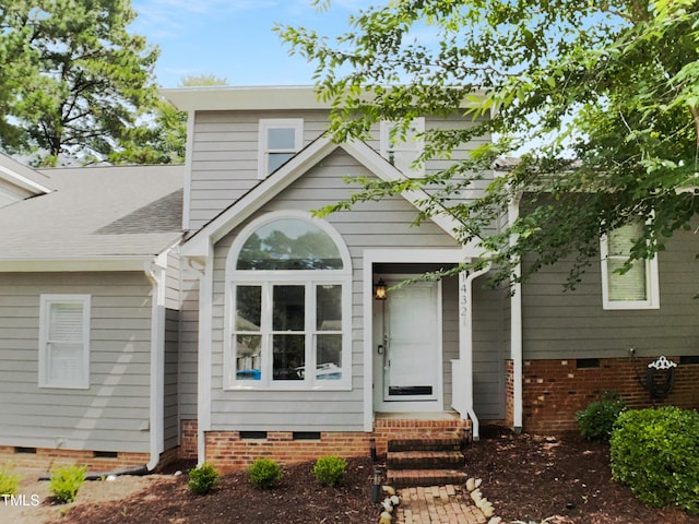 1432 Quarter Pt, Raleigh, NC 27615 - view of front of home with crawl space and roof with shingles