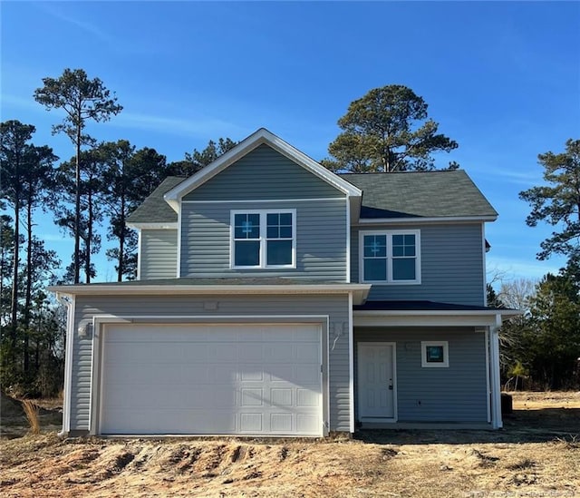 view of front property with a garage