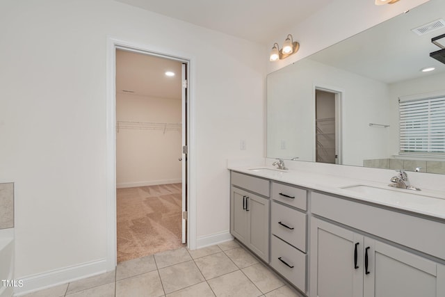 bathroom featuring vanity and tile patterned flooring