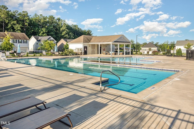 view of swimming pool featuring a patio area