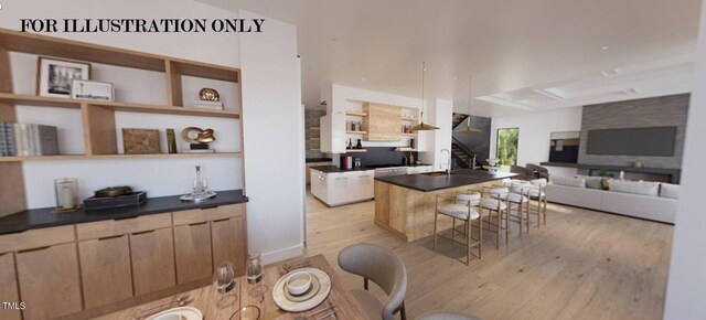 dining area featuring light wood-style floors and stairway