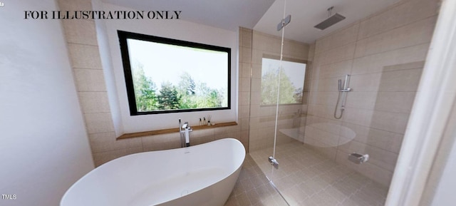 bathroom with tile walls and independent shower and bath