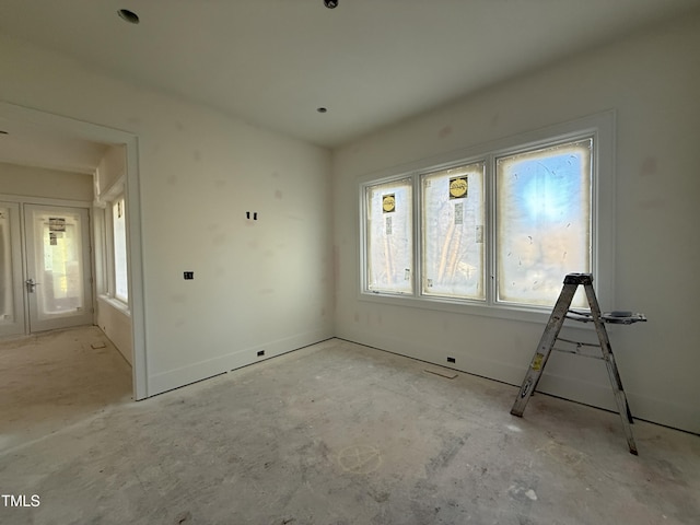 spare room with plenty of natural light