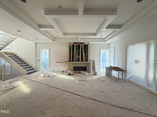 unfurnished living room with plenty of natural light