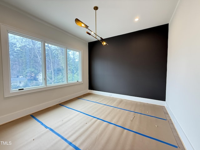 interior space with recessed lighting and baseboards