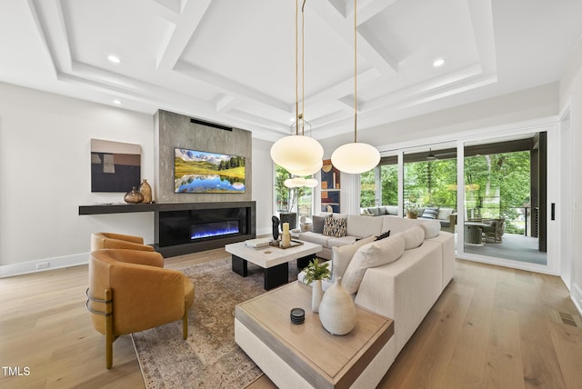 4123 Rockingham Dr, Raleigh, NC 27609 - living room with coffered ceiling, light wood finished floors, a fireplace, recessed lighting, and baseboards