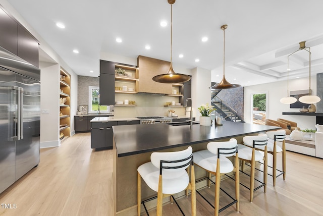 4123 Rockingham Dr, Raleigh, NC 27609 - kitchen featuring a kitchen island with sink, open shelves, modern cabinets, stainless steel built in fridge, and a sink