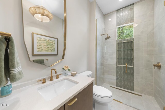 4123 Rockingham Dr, Raleigh, NC 27609 - full bathroom featuring toilet, walk in shower, and vanity