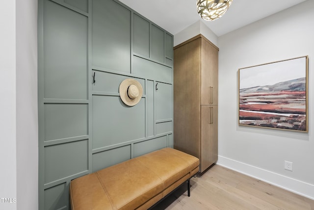 4123 Rockingham Dr, Raleigh, NC 27609 - mudroom with light wood-type flooring and baseboards