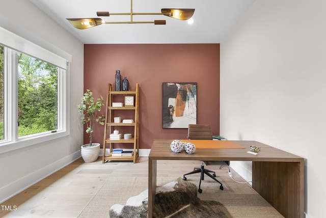 4123 Rockingham Dr, Raleigh, NC 27609 - home office featuring wood finished floors and baseboards