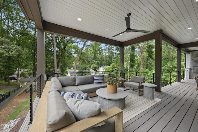 4123 Rockingham Dr, Raleigh, NC 27609 - deck featuring outdoor lounge area, view of wooded area, and ceiling fan