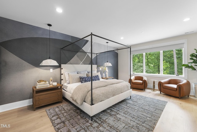 4123 Rockingham Dr, Raleigh, NC 27609 - bedroom featuring light wood-type flooring, baseboards, and recessed lighting