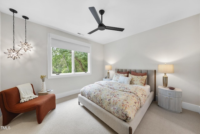 4123 Rockingham Dr, Raleigh, NC 27609 - bedroom featuring light colored carpet, baseboards, and ceiling fan