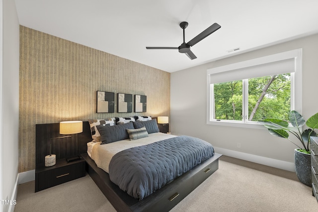 4123 Rockingham Dr, Raleigh, NC 27609 - bedroom with wallpapered walls, carpet floors, baseboards, an accent wall, and ceiling fan