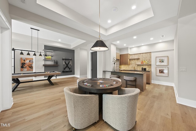 4123 Rockingham Dr, Raleigh, NC 27609 - dining space featuring baseboards, a raised ceiling, light wood finished floors, pool table, and recessed lighting