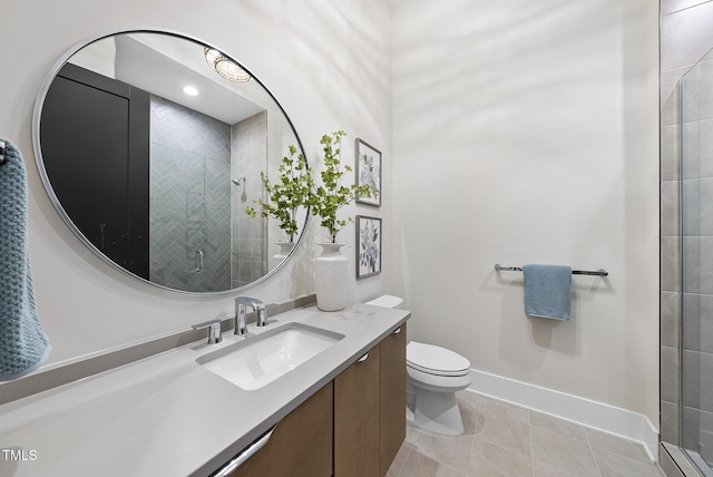 4123 Rockingham Dr, Raleigh, NC 27609 - bathroom featuring a stall shower, vanity, toilet, tile patterned flooring, and baseboards