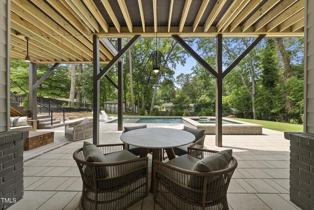 4123 Rockingham Dr, Raleigh, NC 27609 - view of patio featuring view of scattered trees and a pool with connected hot tub