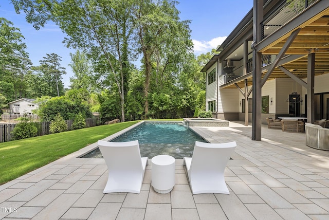 4123 Rockingham Dr, Raleigh, NC 27609 - view of swimming pool with a patio, a pool with connected hot tub, and view of wooded area