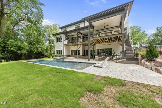 4123 Rockingham Dr, Raleigh, NC 27609 - rear view of house with a ceiling fan, stairs, a balcony, a patio area, and a pool with connected hot tub