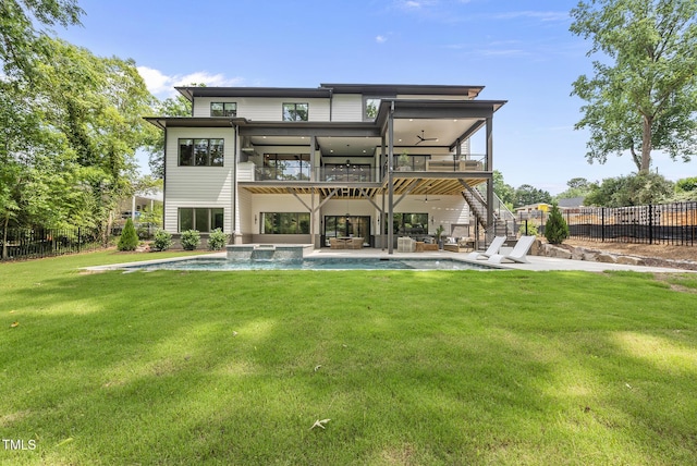 4123 Rockingham Dr, Raleigh, NC 27609 - back of house featuring a balcony, a ceiling fan, a patio, a pool with connected hot tub, and outdoor lounge area