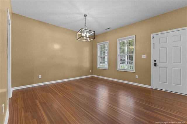60 Hunters Way, Angier, NC 27501 - interior space with an inviting chandelier, visible vents, wood finished floors, and baseboards