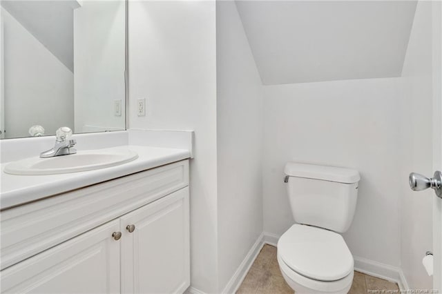 60 Hunters Way, Angier, NC 27501 - half bath featuring lofted ceiling, baseboards, vanity, and toilet