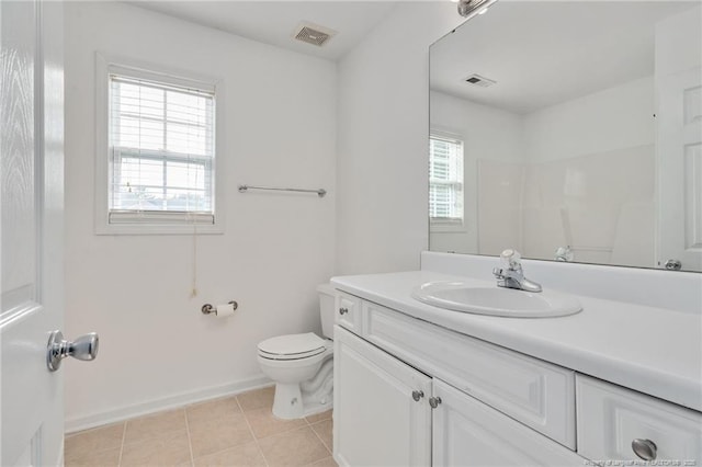 60 Hunters Way, Angier, NC 27501 - full bathroom with baseboards, toilet, visible vents, tile patterned floors, and vanity