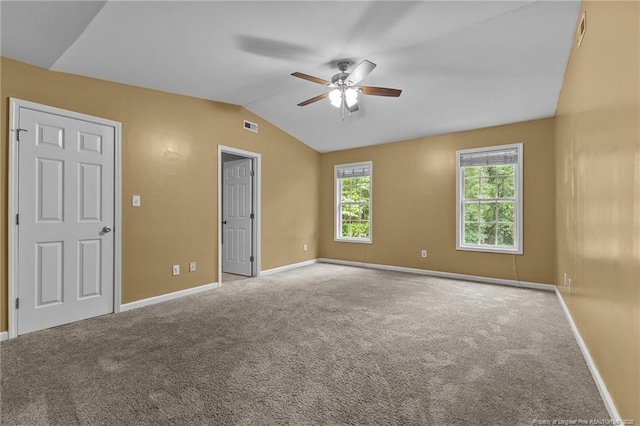 60 Hunters Way, Angier, NC 27501 - carpeted empty room with baseboards, visible vents, ceiling fan, and vaulted ceiling
