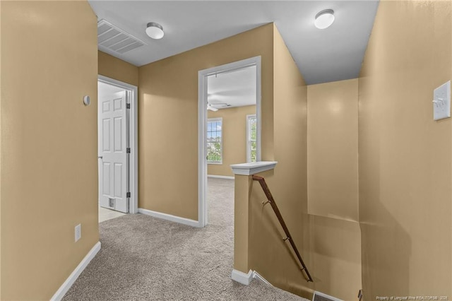 60 Hunters Way, Angier, NC 27501 - corridor with carpet floors, baseboards, an upstairs landing, and visible vents