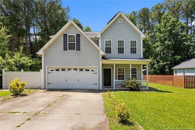 60 Hunters Way, Angier, NC 27501 - traditional-style home with a porch, driveway, and a garage