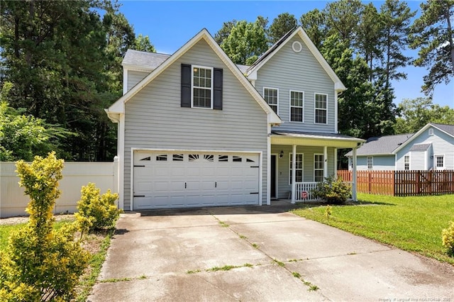 60 Hunters Way, Angier, NC 27501 - traditional-style home featuring covered porch, concrete driveway, and a garage