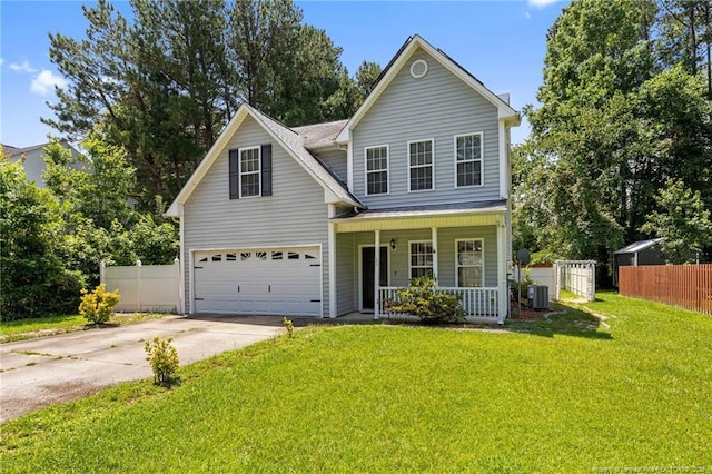 60 Hunters Way, Angier, NC 27501 - traditional home featuring a porch, driveway, and a garage