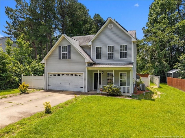 60 Hunters Way, Angier, NC 27501 - traditional-style home with a porch, driveway, and a garage