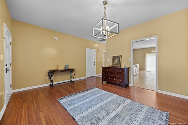 60 Hunters Way, Angier, NC 27501 - living area featuring a chandelier and wood finished floors