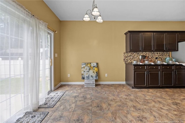 60 Hunters Way, Angier, NC 27501 - dining space featuring a chandelier and stone finish flooring