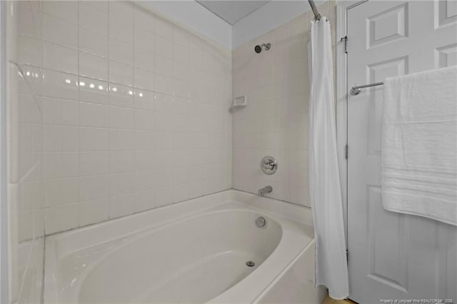 60 Hunters Way, Angier, NC 27501 - bathroom featuring shower / bath combo with shower curtain