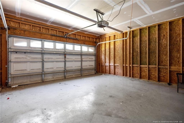 60 Hunters Way, Angier, NC 27501 - garage featuring a garage door opener