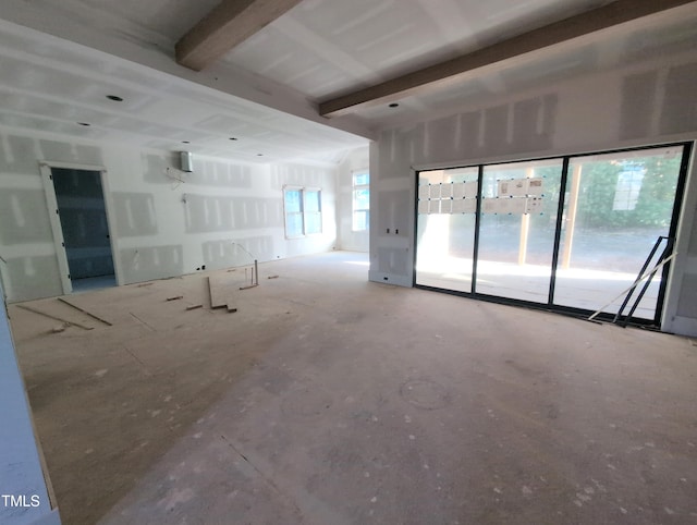 empty room with beam ceiling