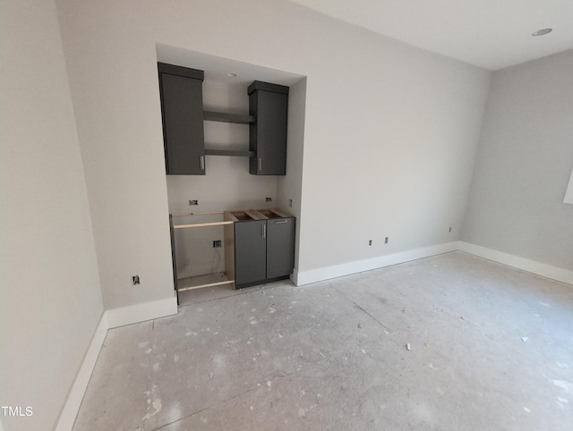 empty room with baseboards