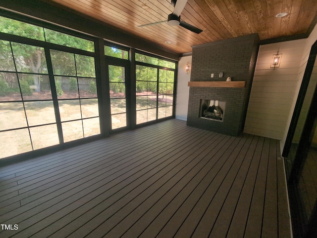 unfurnished sunroom featuring plenty of natural light