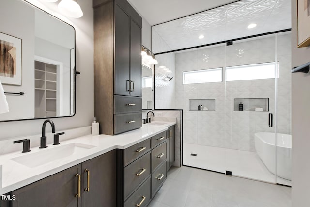 5812 Shawood Dr, Raleigh, NC 27609 - full bath with a stall shower, double vanity, and tile patterned floors