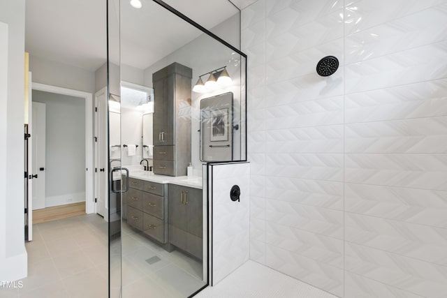 5812 Shawood Dr, Raleigh, NC 27609 - full bathroom with tiled shower, tile patterned floors, and vanity
