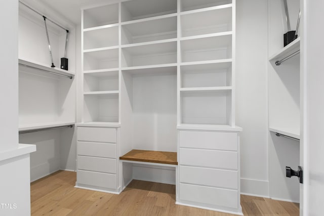 5812 Shawood Dr, Raleigh, NC 27609 - spacious closet with light wood-type flooring